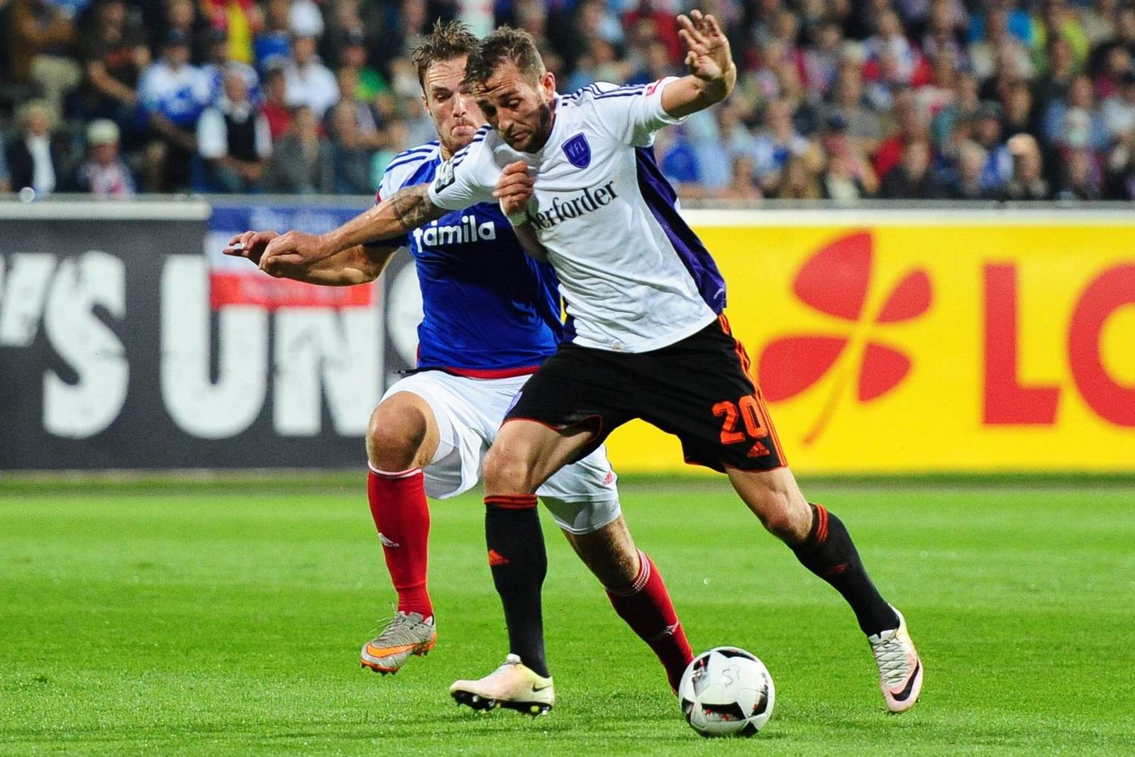 Heider Czichos Osnabrück Holstein Kiel 3.Liga Marc Heider im Zweikampf mit Rafael Czichos. Jetzt auf Osnabrück gegen Holstein Kiel wetten!