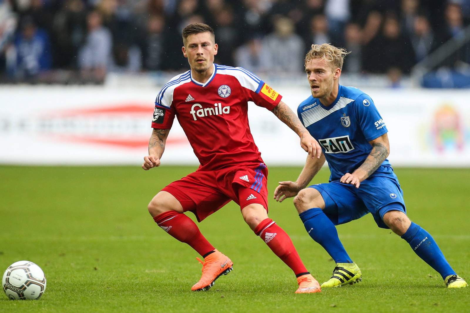 3. Liga Lewerenz Kiel Butzen Magdeburg Steven Lewerenz, Kiel, und Nils Butzen, Magdeburg, im Duell