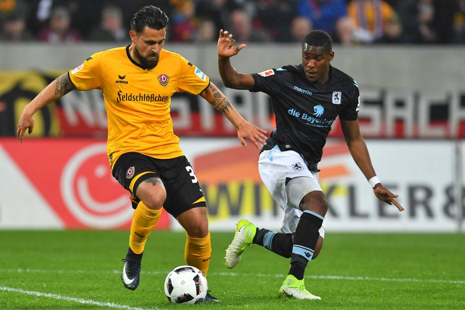 alvarez dresden lacazette 1860 2.bundesliga Marcos Alvarez von Dynamo Dresden im Zweikampf von Romuald Lacazette