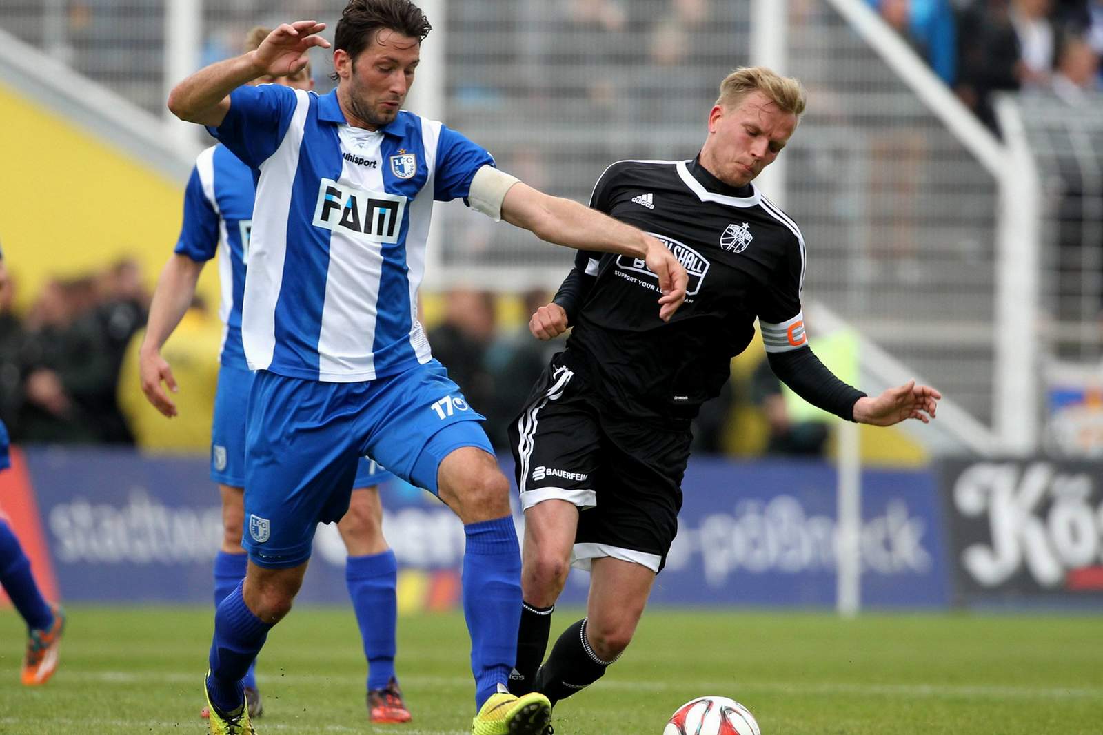marius sowislo, 1. fc magdeburg, rene eckardt, carl zeiss jena, 3. liga Marius Sowislo und René Eckardt im Zweikampf. Jetzt auf das Duell Magdeburg gegen FCC wetten