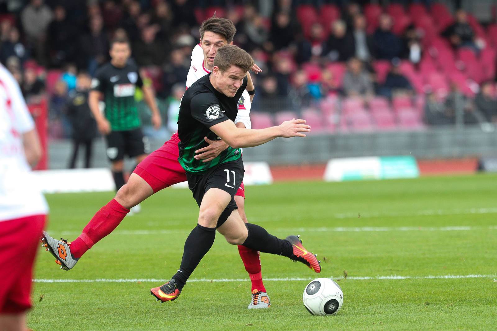 tobias rühle, markus pazurek, 3. liga, preußen münster, fortuna köln Tobias Rühle im Duell mit Markus Pazurek. Jetzt auf die Partie Münster gegen Fortuna Köln wetten