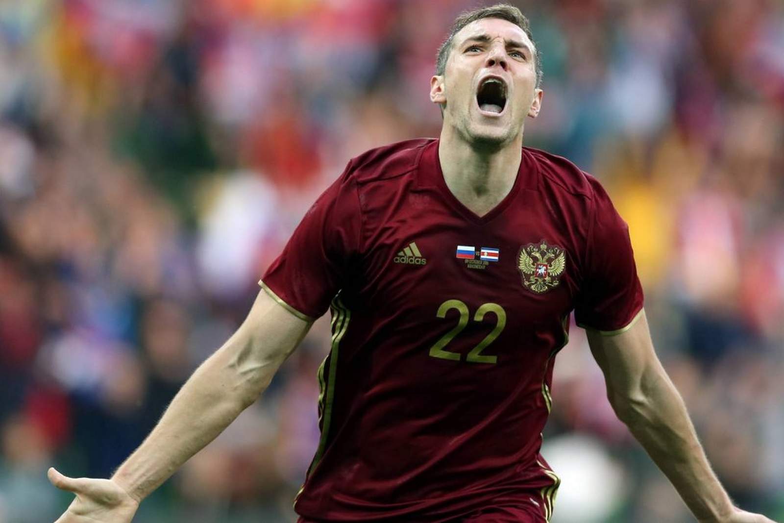 Artyom Dzyuba freut sich über ein Tor. Jetzt auf Russland gegen Uruguay wetten.