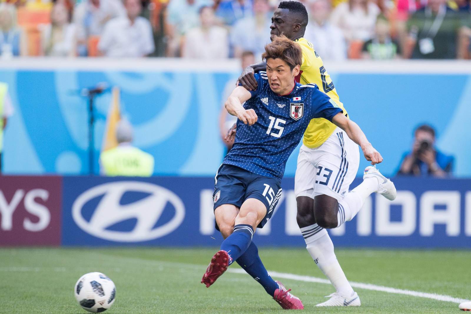 Yuya Osako schießt den Ball aufs Tor. Jetzt auf Japan gegen Senegal wetten.